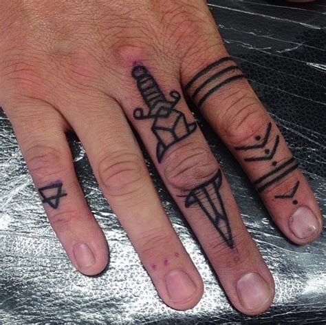 18 Finger Tattoos For Men: The Ultimate Design Guide