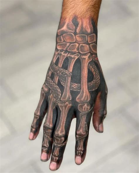 60 Coolest Hand Tattoos For Men A Comprehensive Guide Fashionterest