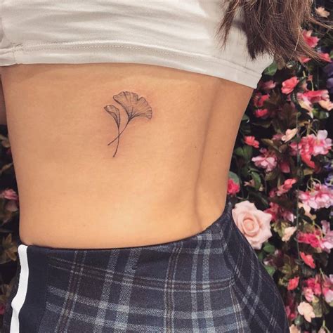 Ginkgo Leaves Tattoo On The Back