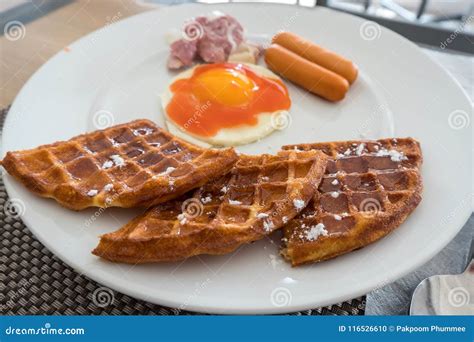 Huge Healthy Breakfast Spread On A Table With Waffles Egg Sausage