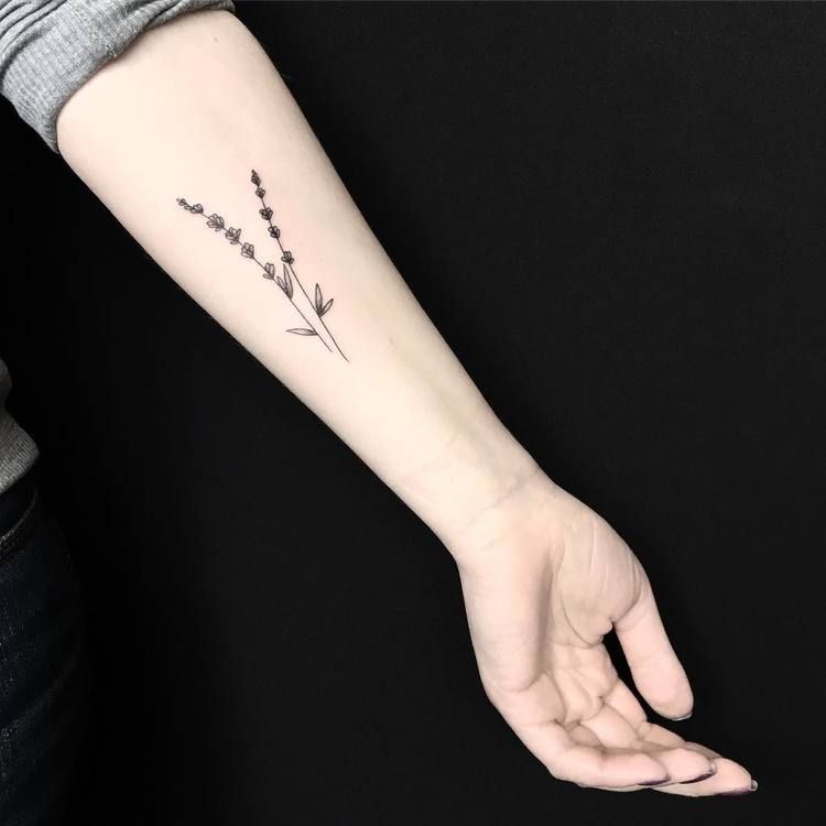 Small Rabbit Tattoo On The Left Inner Arm